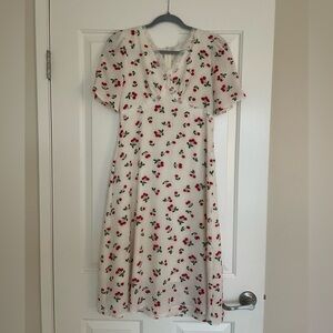 White elegant dress with cherry print.